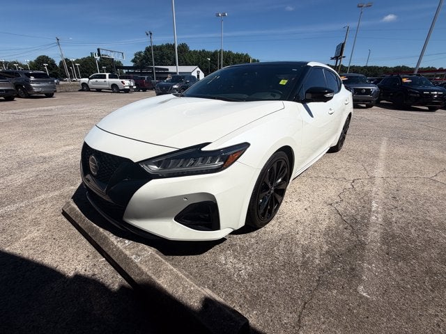 2021 Nissan Maxima SR in Pearl White Tricoat — front three-quarter view