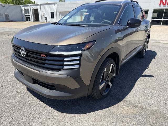 2026 Nissan Kicks SR in Canyon Bronze Metallic — front three-quarter view