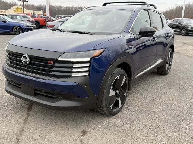 2026 Nissan Kicks SR in Deep Blue Pearl — front three-quarter view