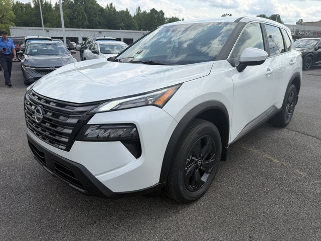 2026 Nissan Rogue SV in Everest White Pearl Tricoat — front three-quarter view