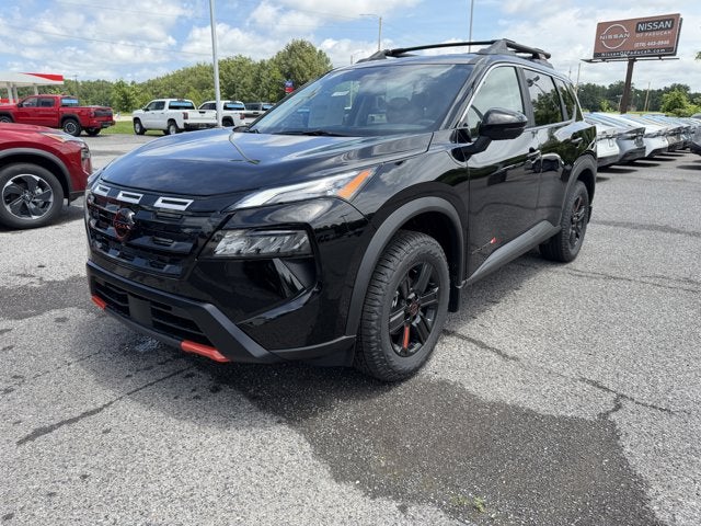2026 Nissan Rogue Rock Creek in Super Black — front three-quarter view