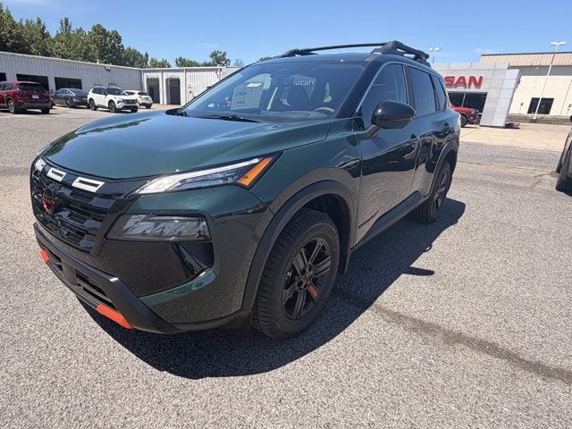 2026 Nissan Rogue Rock Creek in Obsidian Green — front three-quarter view