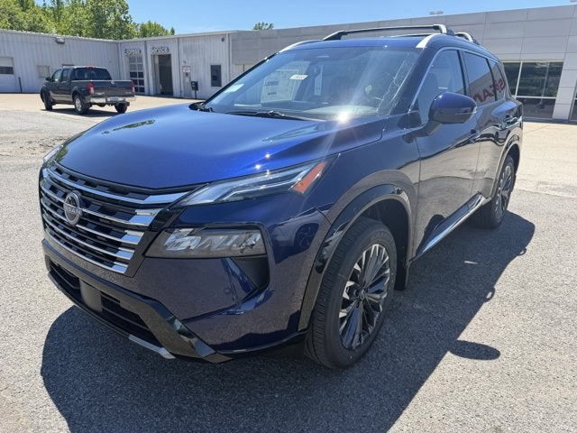 2026 Nissan Rogue Platinum in Deep Ocean Blue Pearl — front three-quarter view