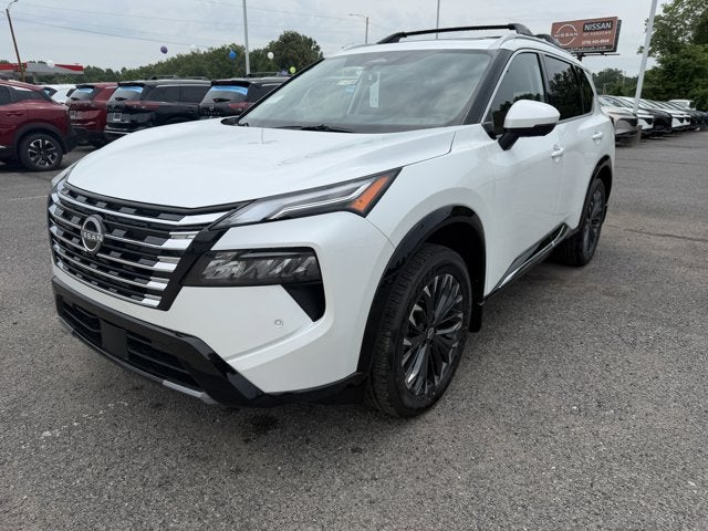 2026 Nissan Rogue Platinum in Everest White Pearl Tricoat — front three-quarter view
