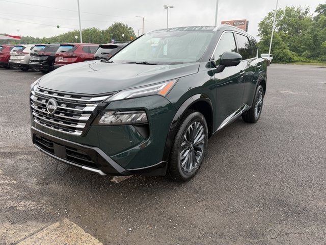 2026 Nissan Rogue Platinum in Obsidian Green — front three-quarter view