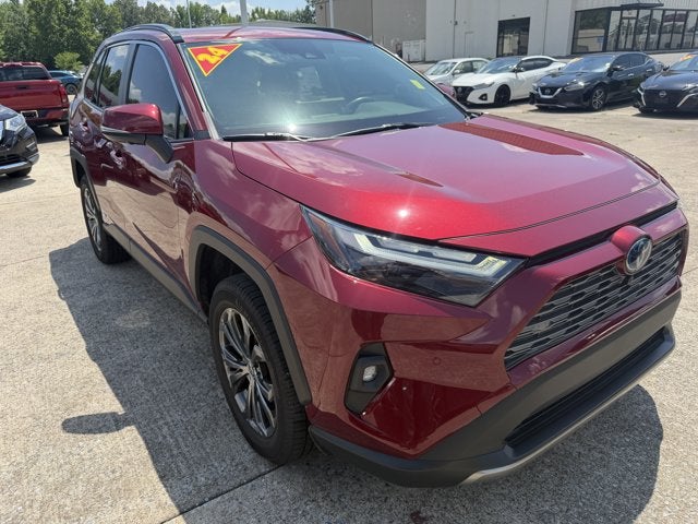 2024 Toyota RAV4 Hybrid Limited in Ruby Flare Pearl — front three-quarter view